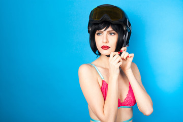 sexy woman in lingerie wearing ski helmet