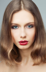 Fototapeta premium Fashion portrait of young beautiful woman with perfect make up.