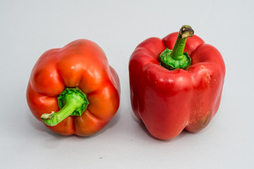 red peppers isolated on grey