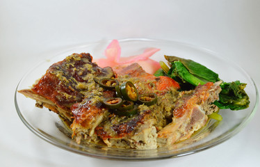 slice long green chili on roast duck