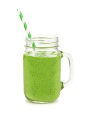 Healthy green smoothie with straw in a jar mug isolated