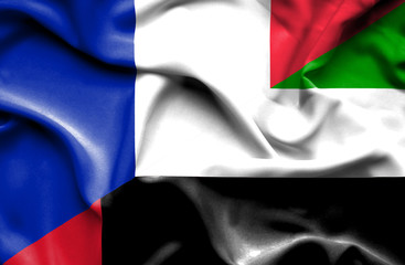 Waving flag of United Arab Emirates and France