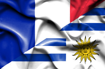 Fototapeta premium Waving flag of Uruguay and France