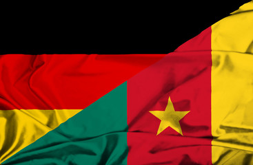 Waving flag of Cameroon and Germany