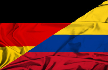 Waving flag of Columbia and Germany