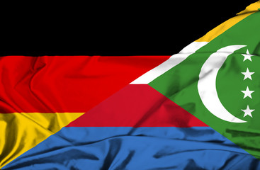 Waving flag of Comoros and Germany