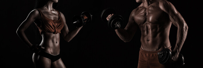 Bodybuilding. Strong man and a woman posing on a black backgroun