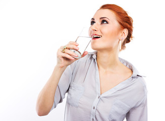Naklejka premium Happy young girl with a glass of water.