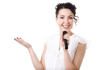 Young businesswoman announcer with microphone on white backgroun