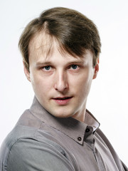 Portrait of young caucasian man, isolated over a white backgroun