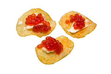 Red caviar on potato chips