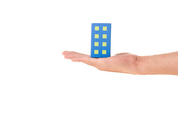 Wooden toy's Building in hand on White Isolated background
