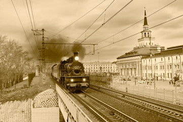 Steam retro train goes in the center of Moscow.