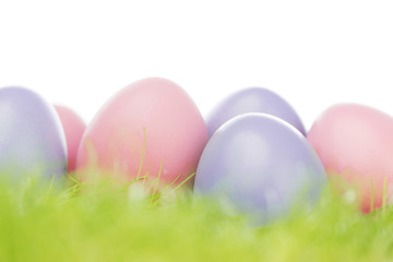 Fototapeta na wymiar Easter eggs in grass