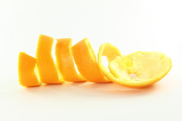 Fototapeta na wymiar orange peels in white background