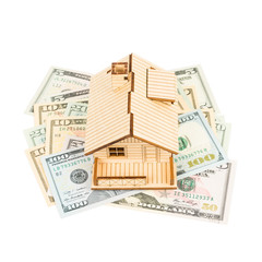 Model house on dollar banknote concept housing expense