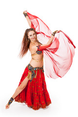 Young belly dancer in motion