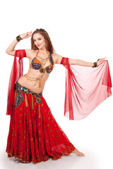 Young belly dancer in dance pose
