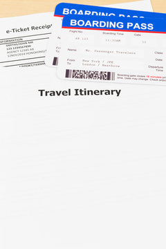 Travel itinerary with copy space, plane model, and boarding pass