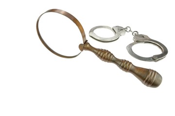 Retro Magnifying Glass and Handcuffs