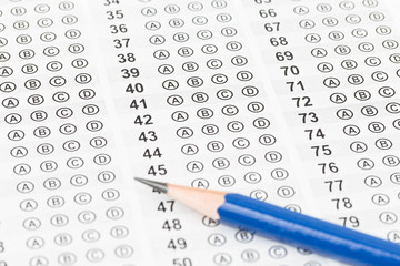 Blank answer sheet with pencil