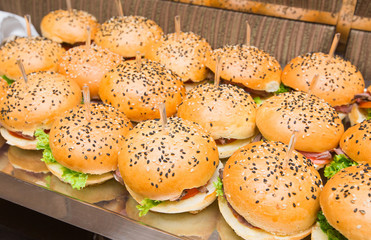 Catering - served table with hamburgers snack