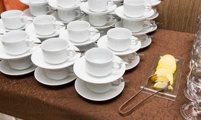 Catering - rows of cups served for tea table