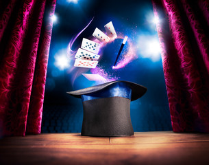 High contrast image of magician hat on a stage - obrazy, fototapety, plakaty