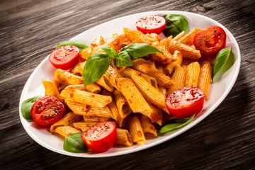 Pasta with pesto sauce and vegetables