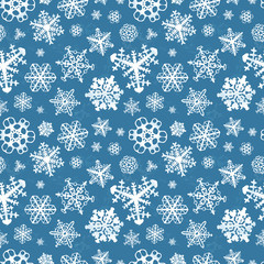 Different modern snowflakes on blue background seamless pattern