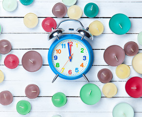 Retro alarm clock and candles