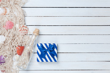 Gift box with net and bottle