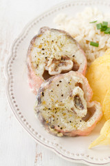 boiled fish with potato chips and boiled rice