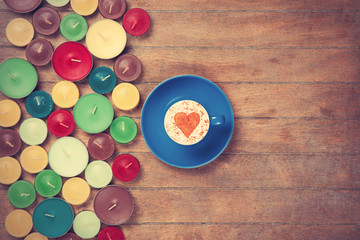 Cup and candles on a talbe