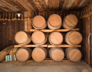 close up wine barrels stacked