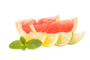 Fresh grapefruits, limes, lemons and mint