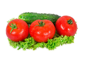 Three tomatoes and cucumber