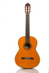 Naklejka premium Yellow acoustic guitar on a white background