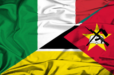 Waving flag of Mozambique and Italy