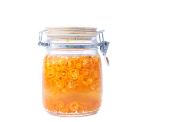 Chilli in White Vinegar on White Isolated background