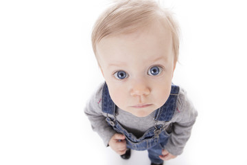 Baby girl in overalls