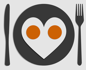 Two heart fried egg yolks