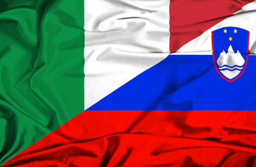 Waving flag of Slovenia and Italy