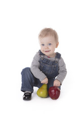 Fototapeta premium Baby girl in overalls
