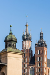 Fototapeta na wymiar Towers of St.Mary and Sukienice (cloth market) in Krakow