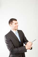 Young manager taking notes