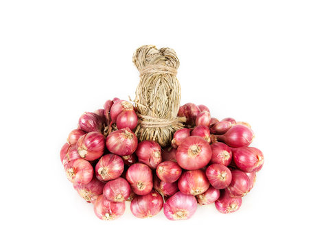 close up bundle of red onion or shallots