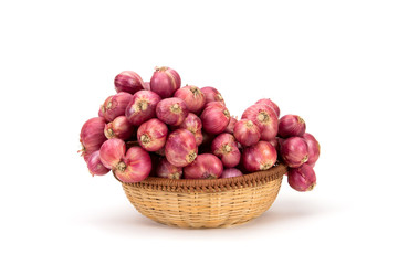 close up red onion or shallots in wooden basket