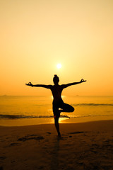 woman practicing yoga