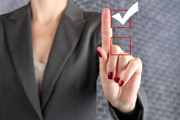 Businesswoman  making  a choice on  virtual Graph by hand.